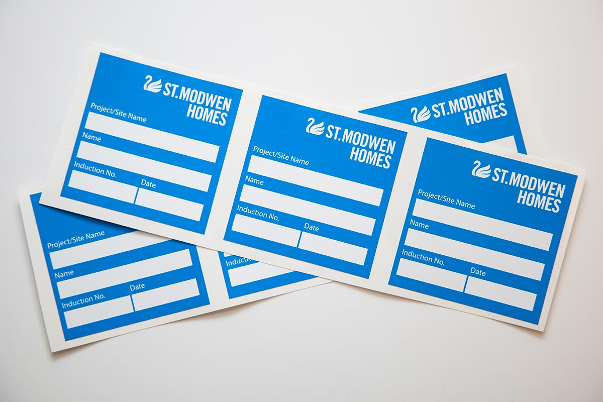 two sheets of blue custom colur labels