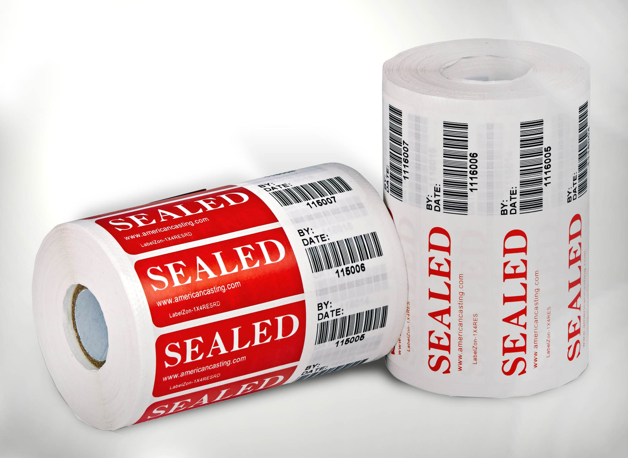 two rolls of red and black sealed void labels